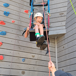 Camp wamp camper rock climbing