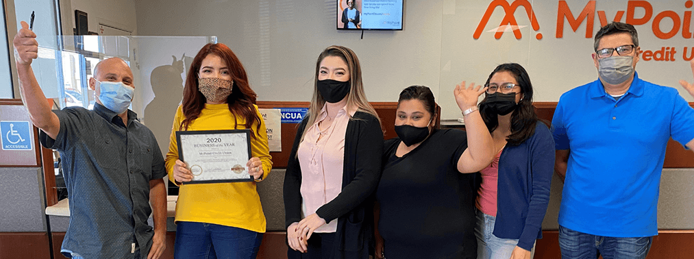 MyPoint National City team holding a certificate.