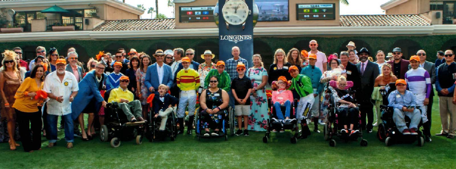 Group picture at Del Mar from an event with MyPoint Credit Union and the Wampler Foundation for Kids with Disabilities.